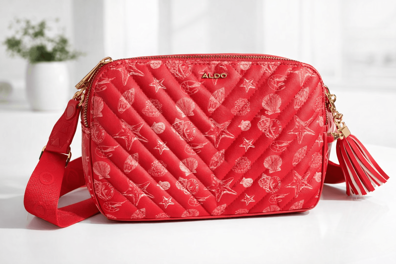 CARTERA ALDO NARANJA CON PATRONES MARINOS